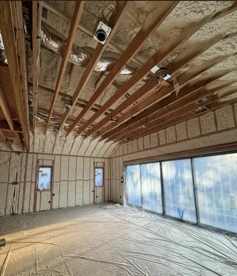 Interior walls and ceiling insulated with spray foam during new construction in Red Bank